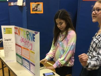 girls with project on internet safety  